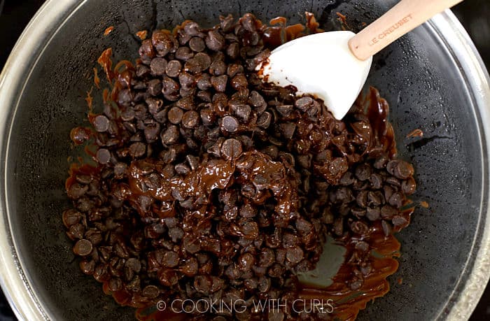 Chocolate chips starting to melt in a double boiler. 