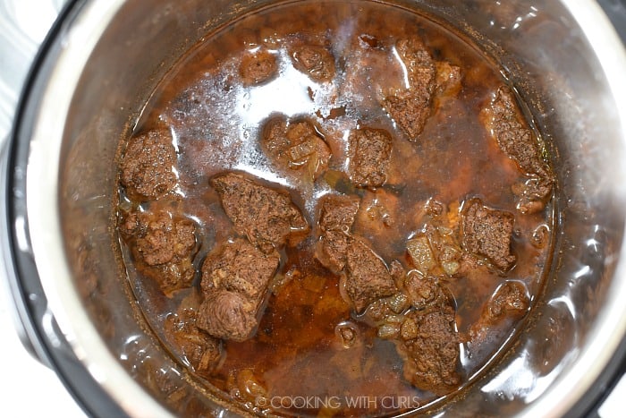 Cooked Cafe Mocha Pot Roast in a pressure cooker. 