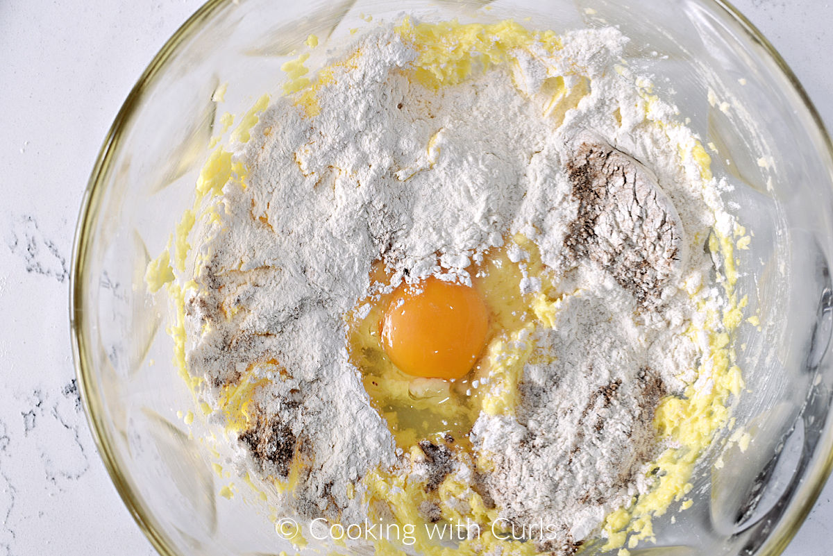 Flour mixture and egg added to the creamed butter. 