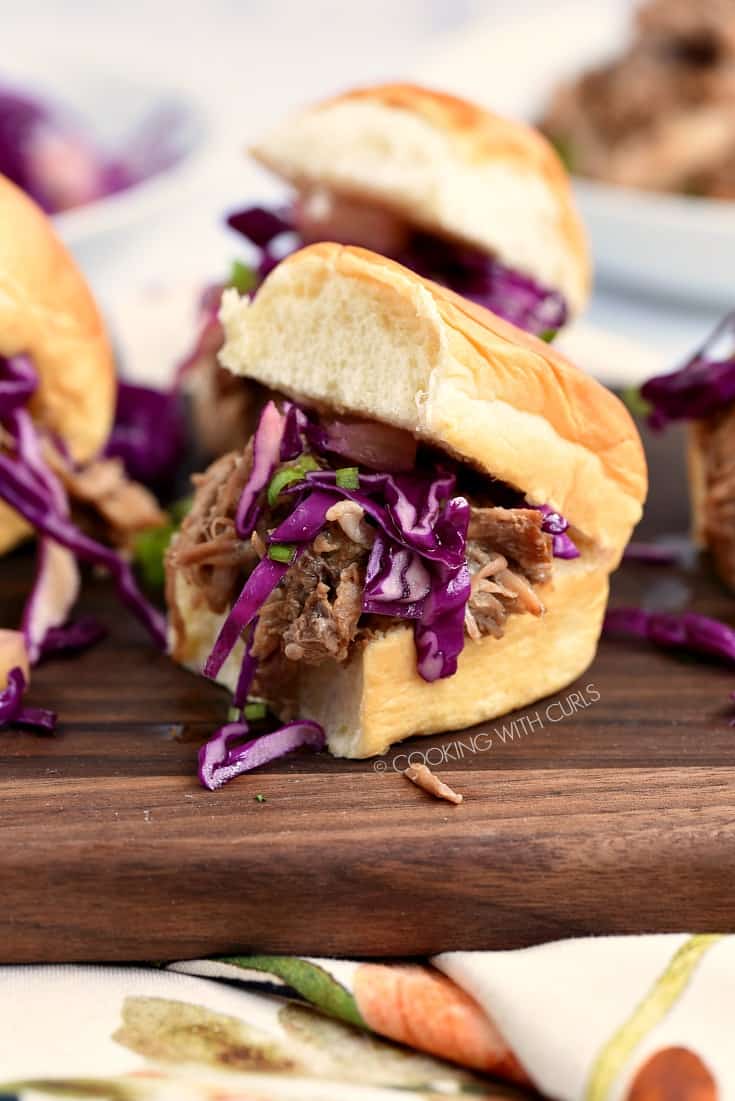 Hawaiian Pulled Pork sliders on a wooden serving board