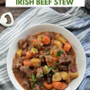 Looking down on two bowls of beef stew with carrots and potatoes with title graphic across the top.