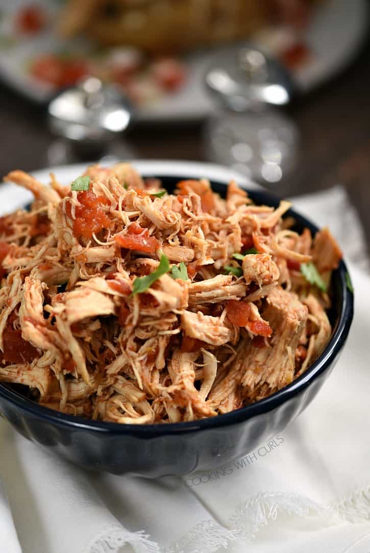 This Instant Pot Taco Chicken Filling is tender and delicious with tons of flavor! cookingwithcurls.com