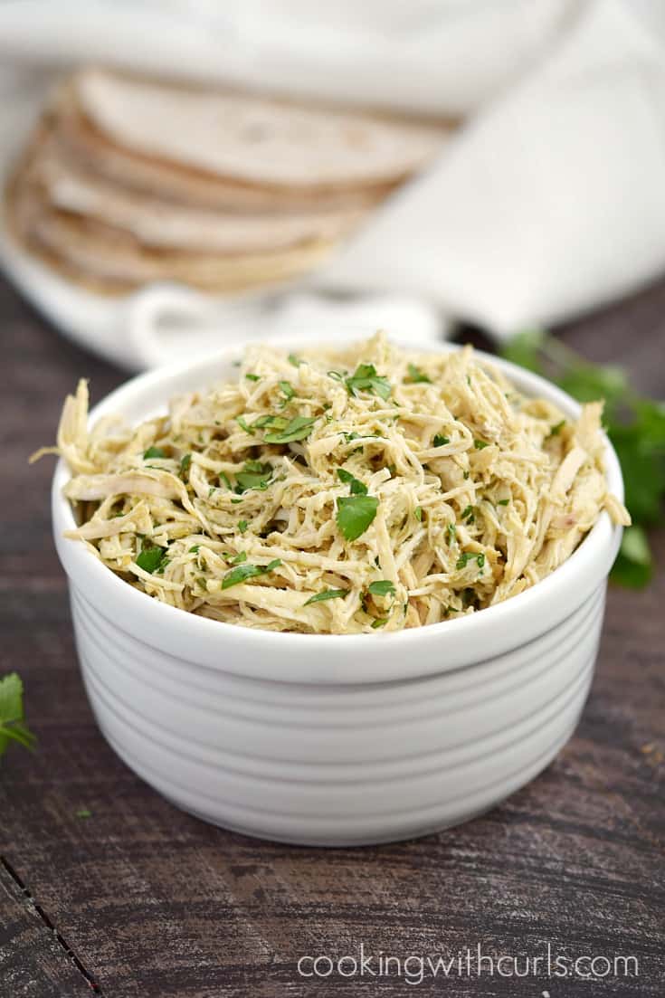 This Instant Pot Salsa Verde Shredded Chicken is versatile enough to be used as a filling for burritos, and as a topping for salads | cookingwithcurls.com