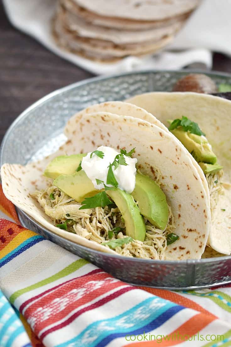 This Instant Pot Salsa Verde Shredded Chicken makes a delicious filling for tacos and burritos | cookingwithcurls.com